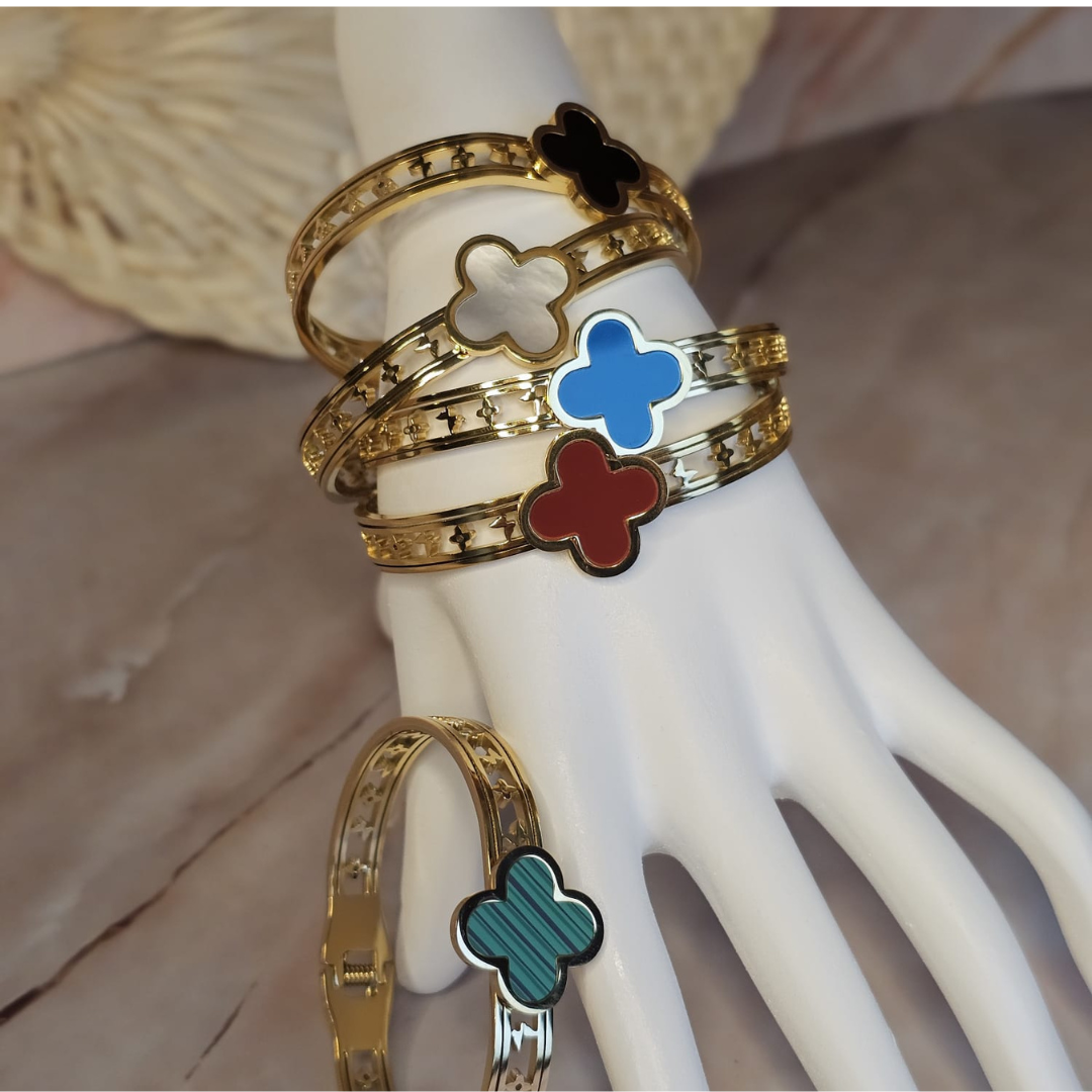 Naira - bangles in silver and gold with colored inlays