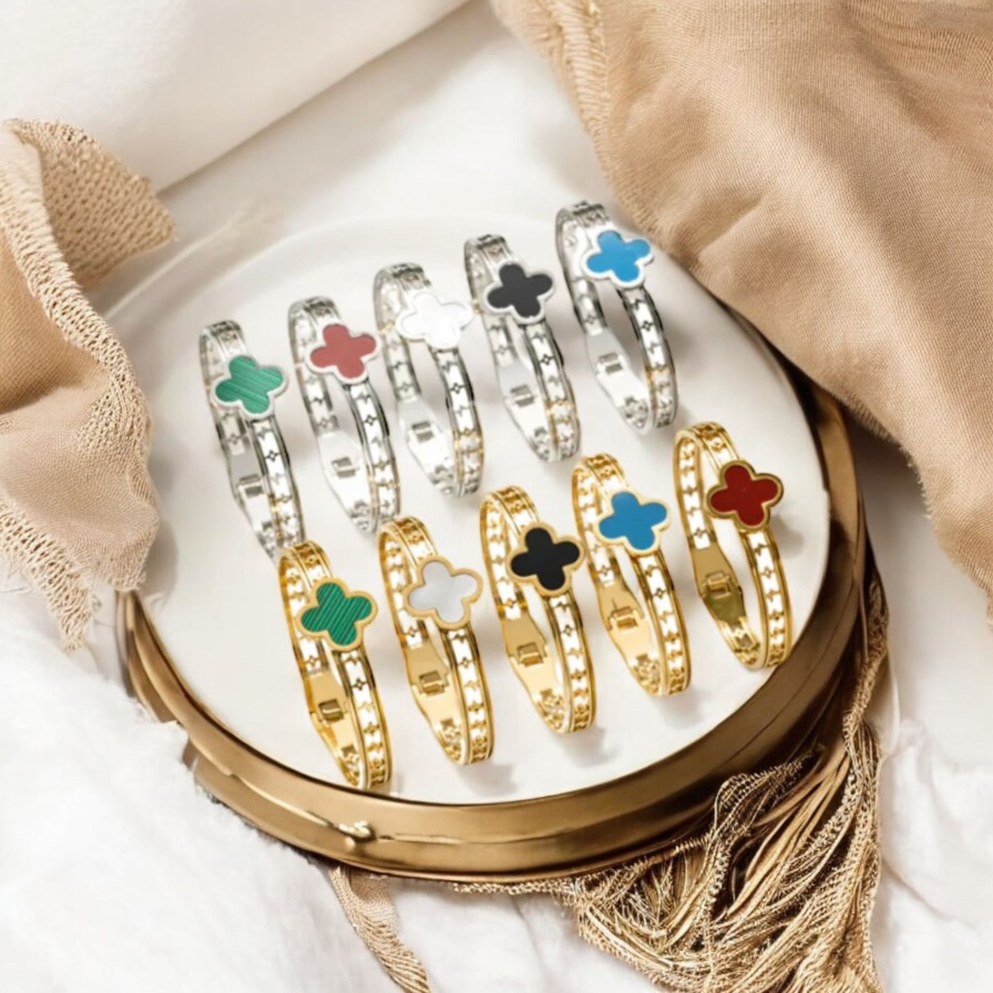 Naira - bangles in silver and gold with colored inlays