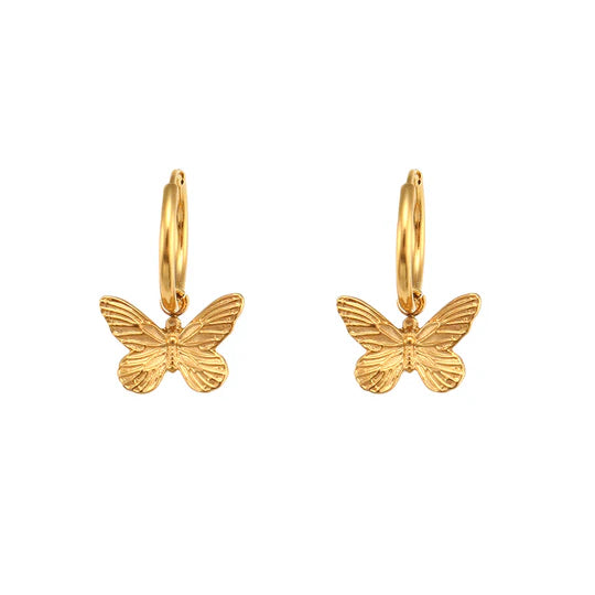 Créoles délicates avec pendentif papillon