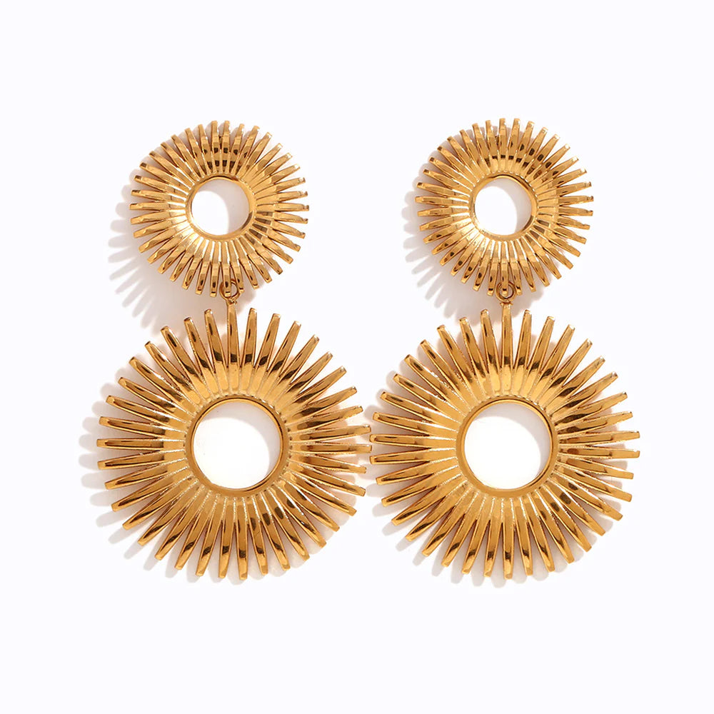 Boucles d'oreilles Solara – Boucles d'oreilles pendantes dorées en forme de soleil