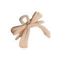 Pince à cheveux nœud perles Bohème – Élégante pince à cheveux avec nœud et détails perlés beige