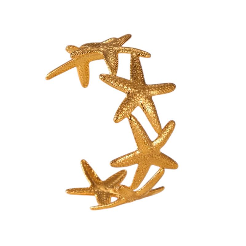 Stella – Bracelet jonc étoiles de mer doré, Manchette marine statement