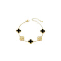 Neyda - Bracelet en or avec pendentifs noirs/blancs et ornés de cristaux