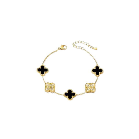 Neyda - Armkette in Gold mit Schwarzen /Weissen und Kristallbesetzten Anhängern
